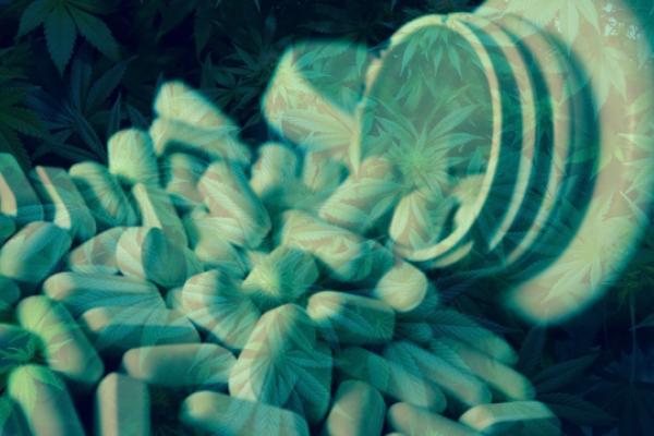 Spilled out pills overlaid with Cannabis leaves